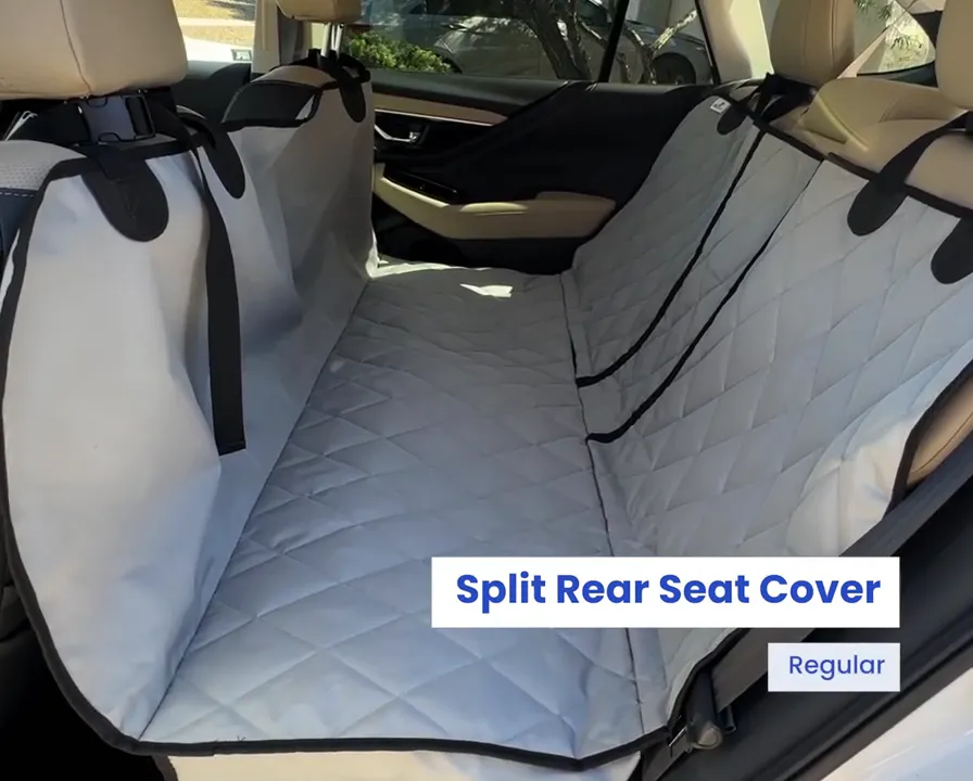 Gray quilted split rear seat cover installed across the Subaru Outback back seat in hammock configuration