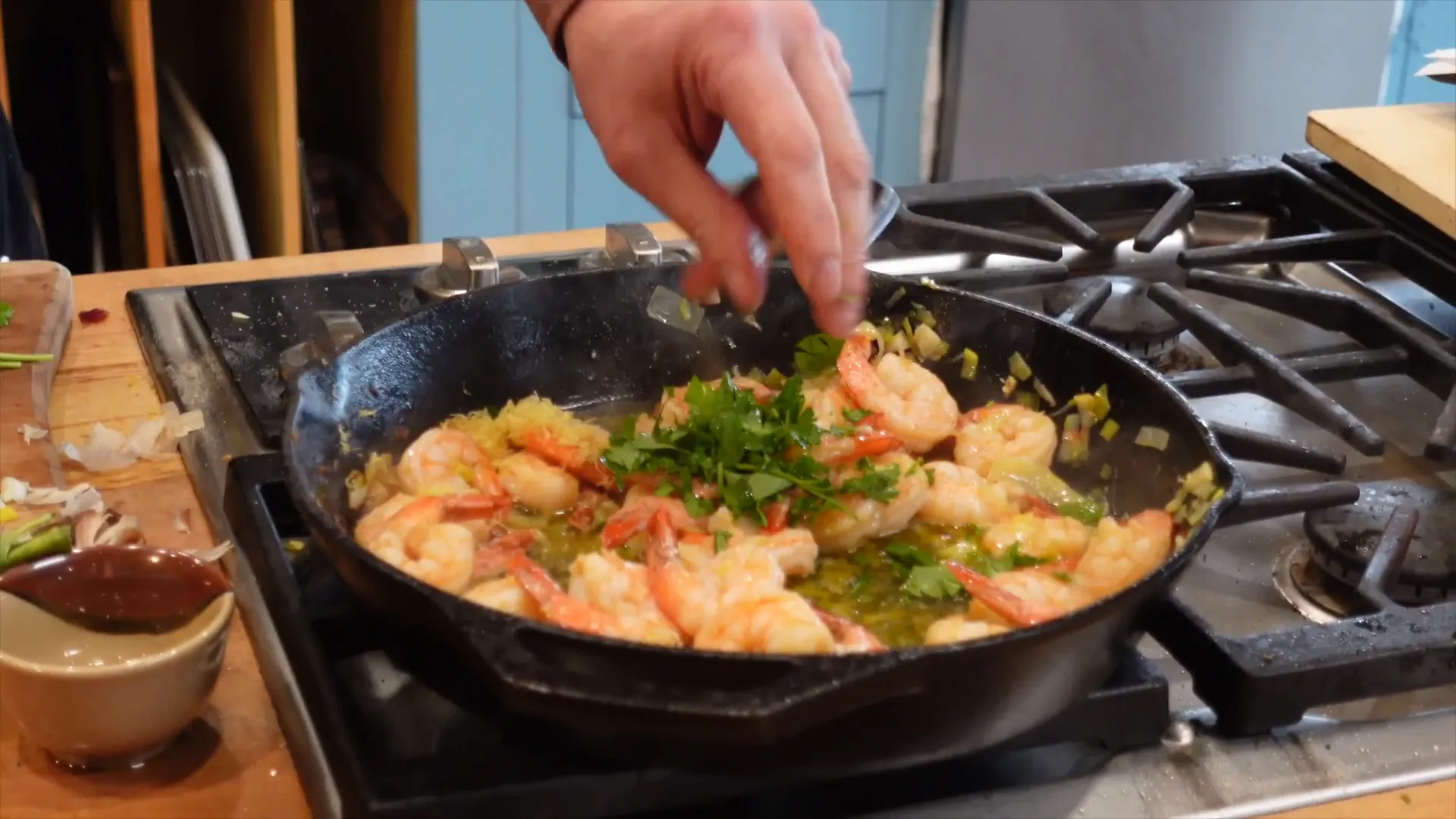 Cooking sizzling lemon garlic shrimp