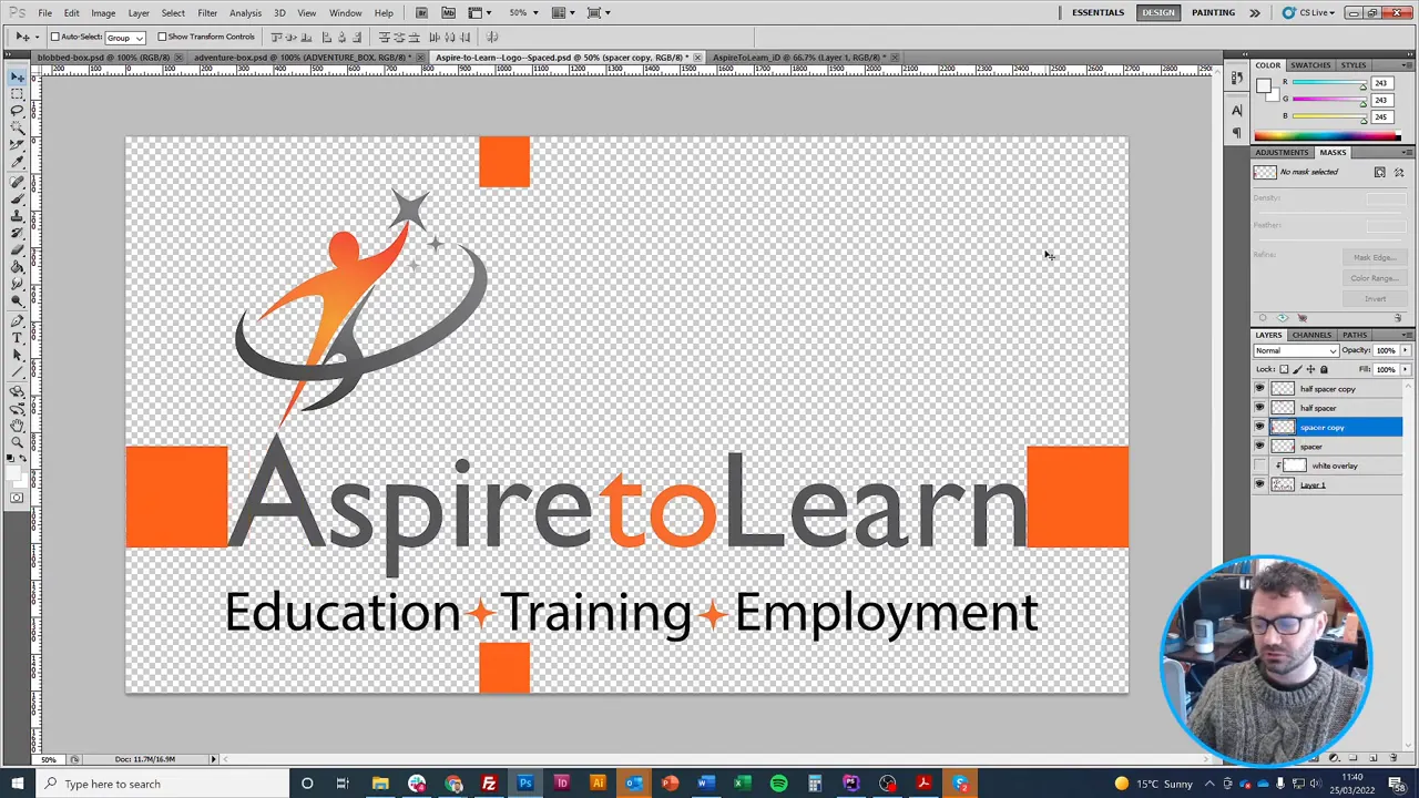 Logo open in Photoshop showing large orange spacer blocks at the left, right, top and bottom to demonstrate X clear space