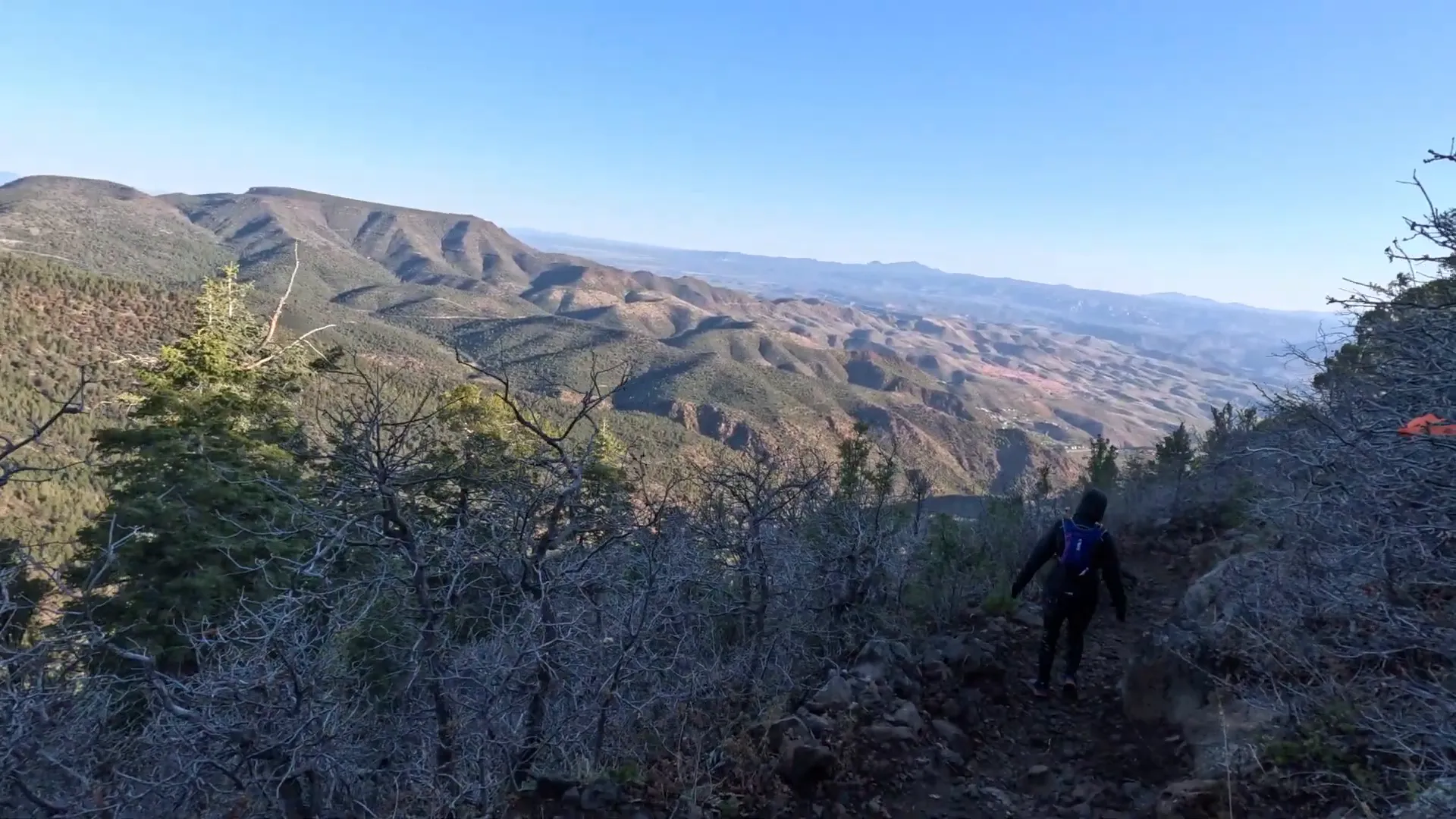 Descending Mount Mingus with snow patches visible