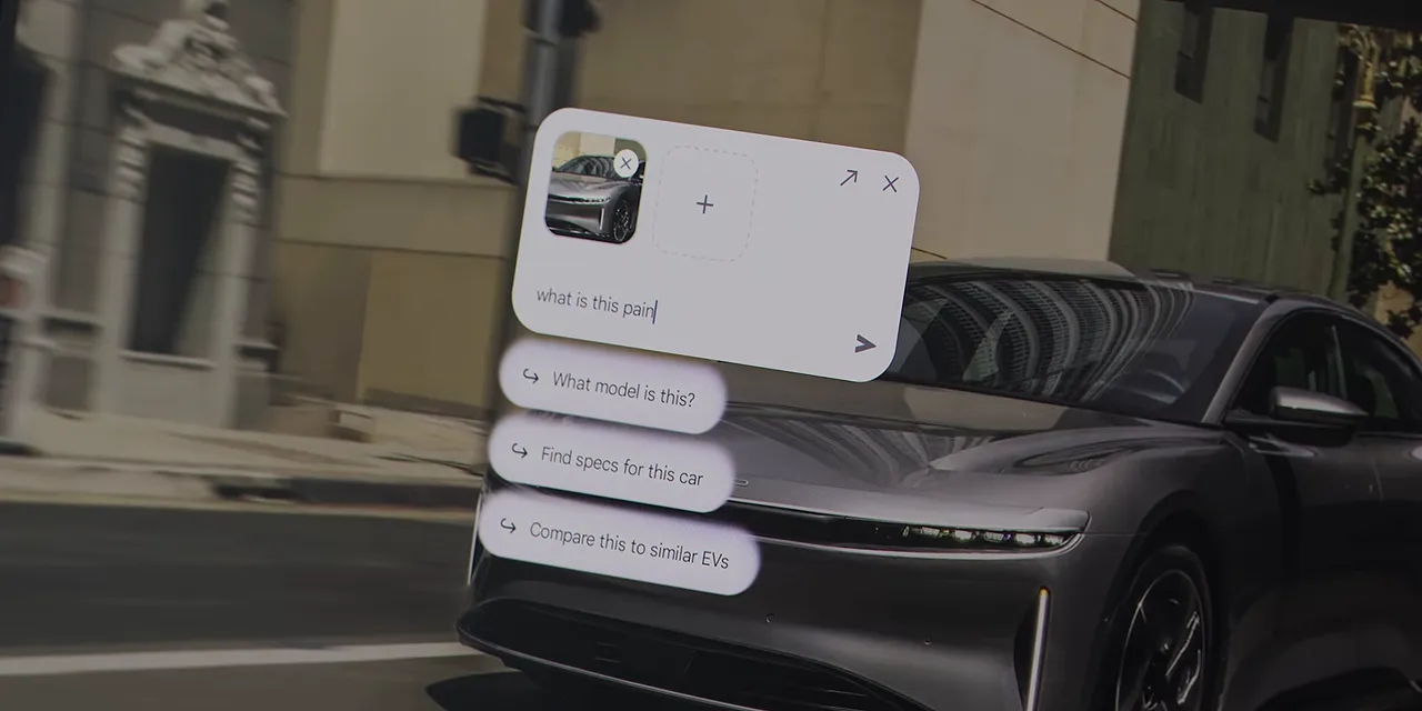 A car image on a laptop screen with a floating Gemini card and suggested prompts