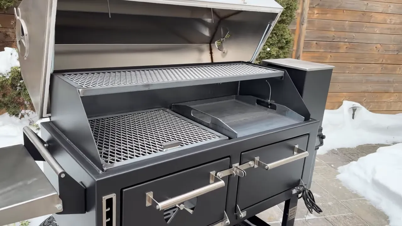 Open El Fuego Trio with an upper rack, lower cooking grate, plancha, and two front access doors