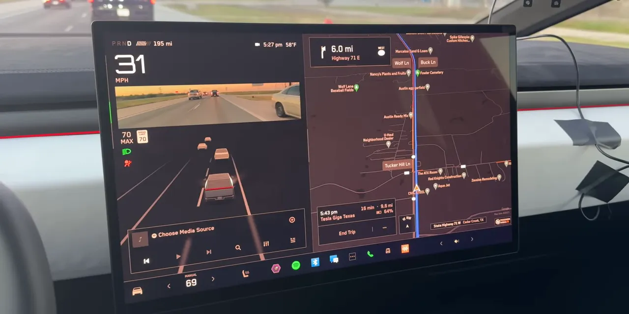 Cybertruck touchscreen displaying navigation, driving visualization, and a rear camera preview
