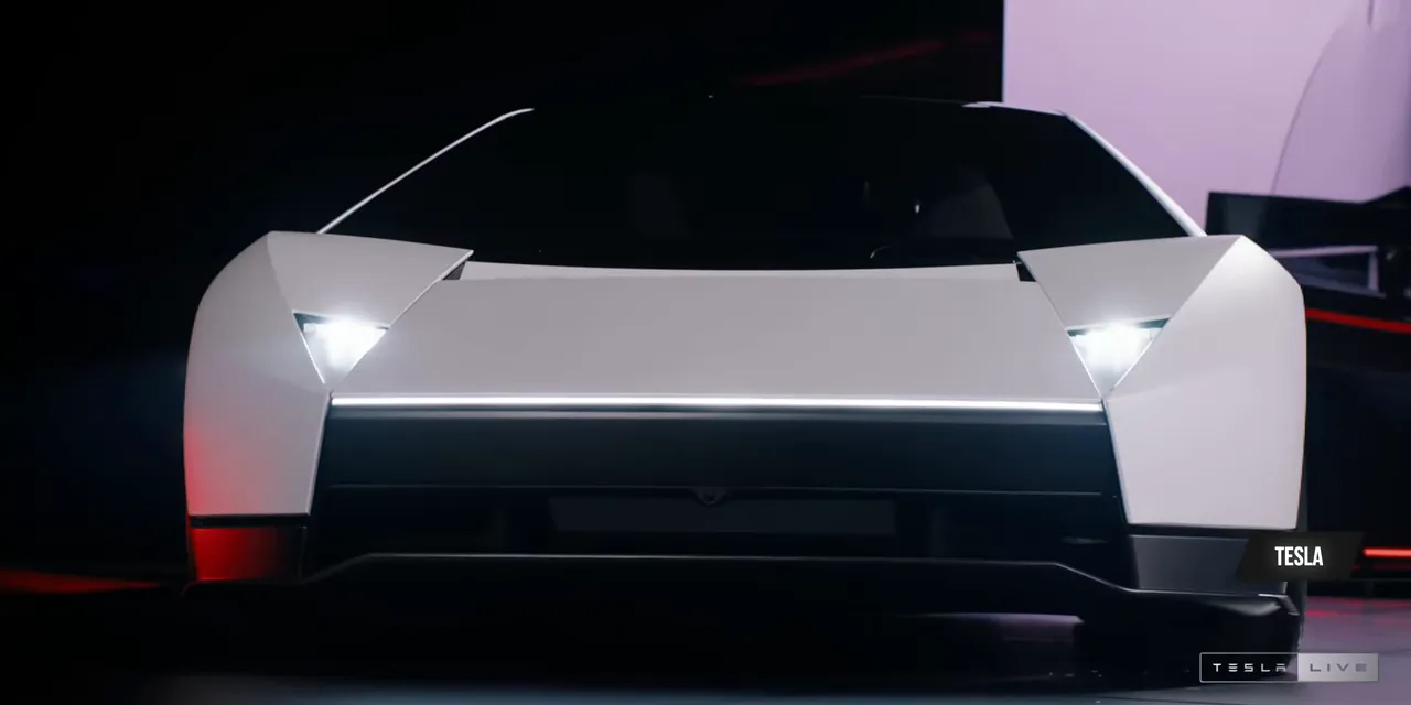 White angular Roadster seen from the front with narrow headlights and a horizontal light bar