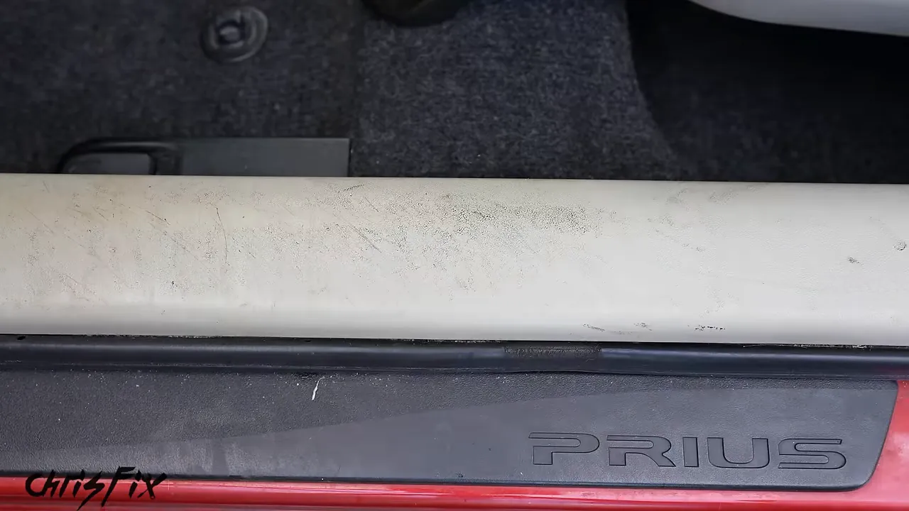 Before-and-after comparison of a stained and cleaned Prius door sill