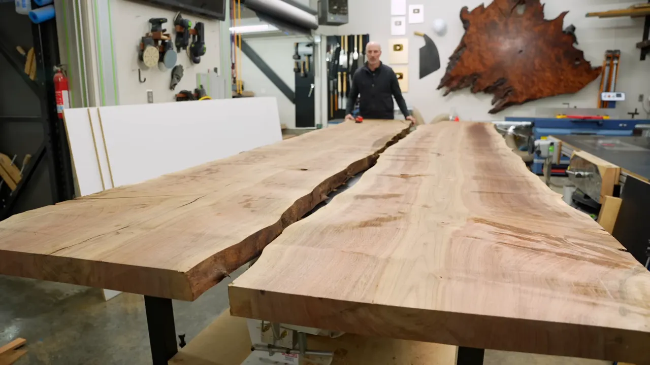 Two wide wood slabs positioned side by side with a gap between their inner edges