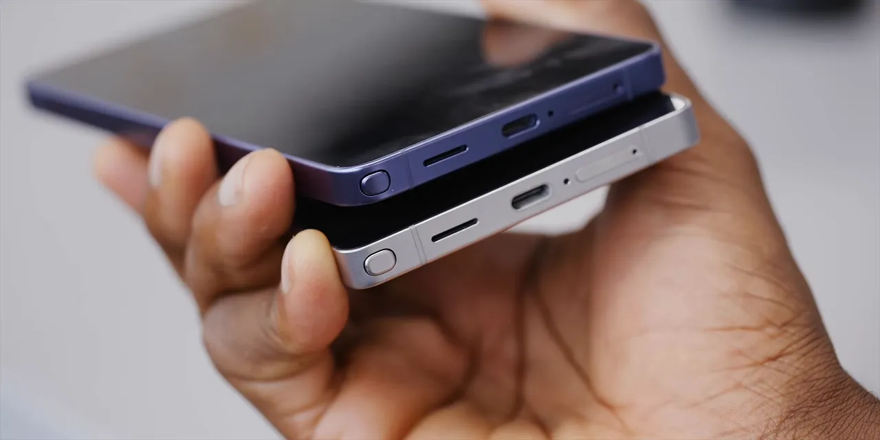 Close-up of two stacked phones showing their bottom edges, corners, ports, and S Pen caps