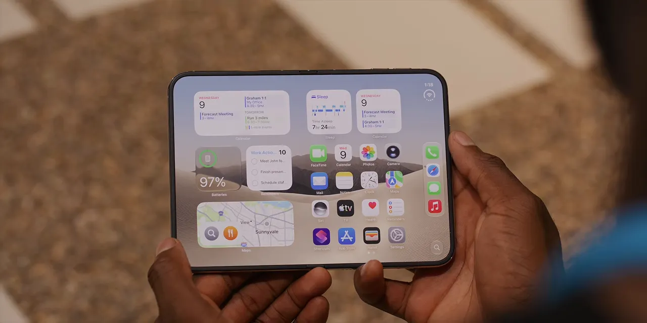 Unfolded iPhone Duo held in two hands with widgets and app icons across its inner display