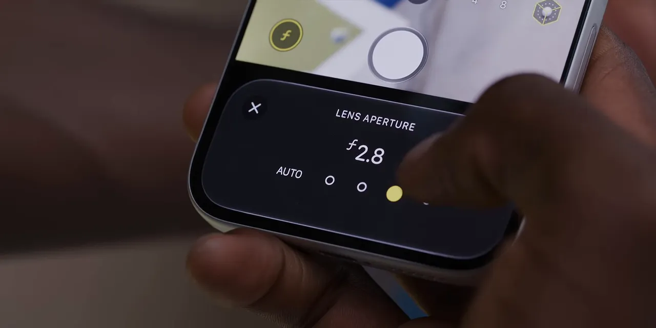 Camera app showing the Lens Aperture control set to f/2.8