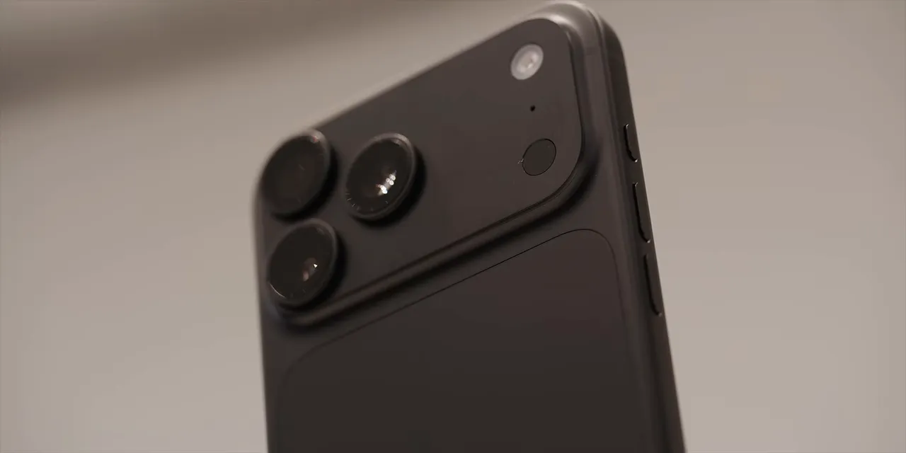 Close-up of the matte black iPhone Pro rear panel and triple-camera array