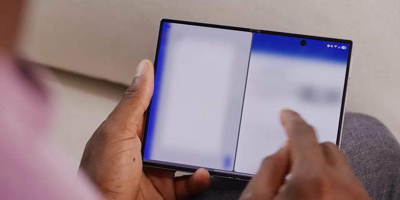 Unfolded phone displaying two apps side by side