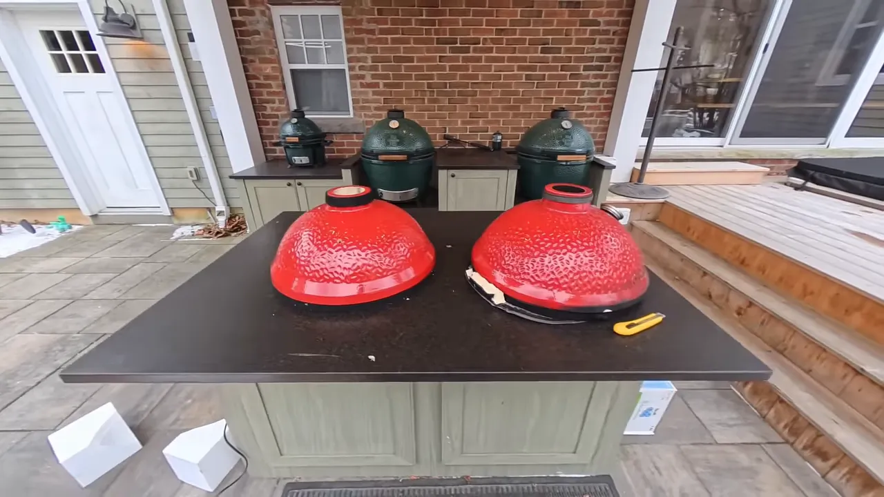 Two red replacement grill domes labeled Series 1 and Series 2 on a counter