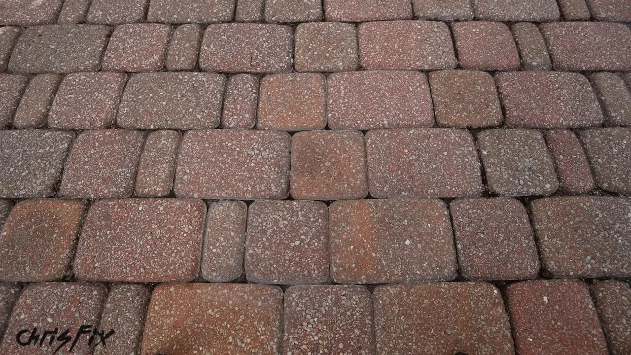 Driveway pavers after the oil stain treatment has been removed