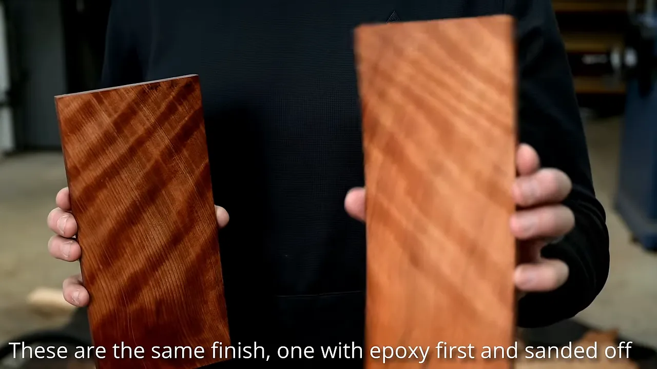 Two redwood finish samples held side by side, one darker and one lighter
