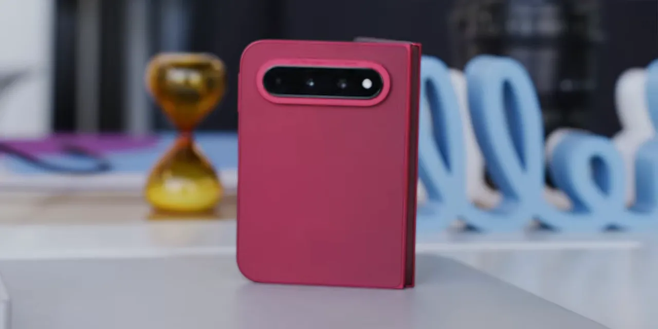 Rear of the red Xiaomi folding phone with three cameras in a horizontal camera bar