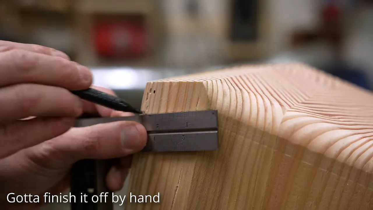 Close-up of a rounded Douglas fir corner with growth rings wrapping across the curved surface