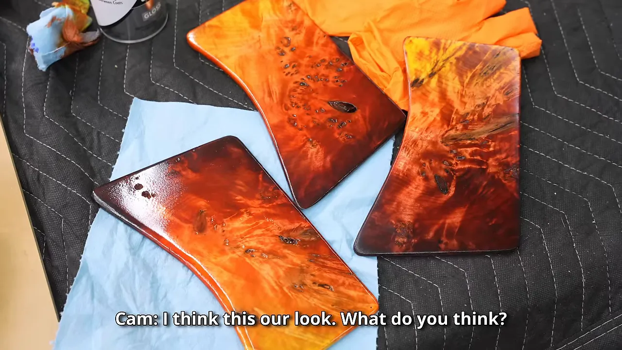 Miniature desk-shaped burl samples with yellow, orange, and red gradients