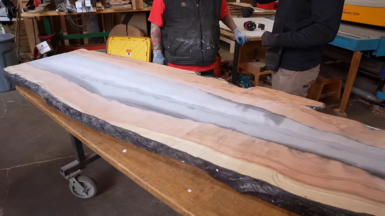 Surfaced slab showing a long dark center bordered by pale redwood