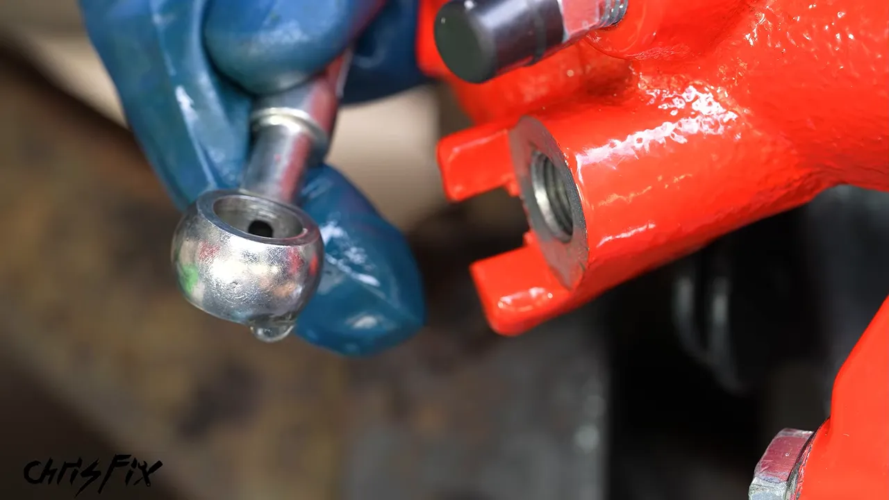 Banjo bolt and brake hose fitting with copper washers on opposite sides of the fitting