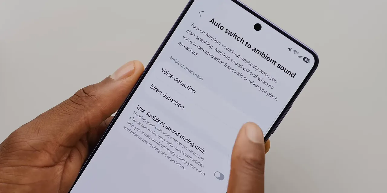 A phone displaying the Auto switch to ambient sound settings page with two enabled toggles