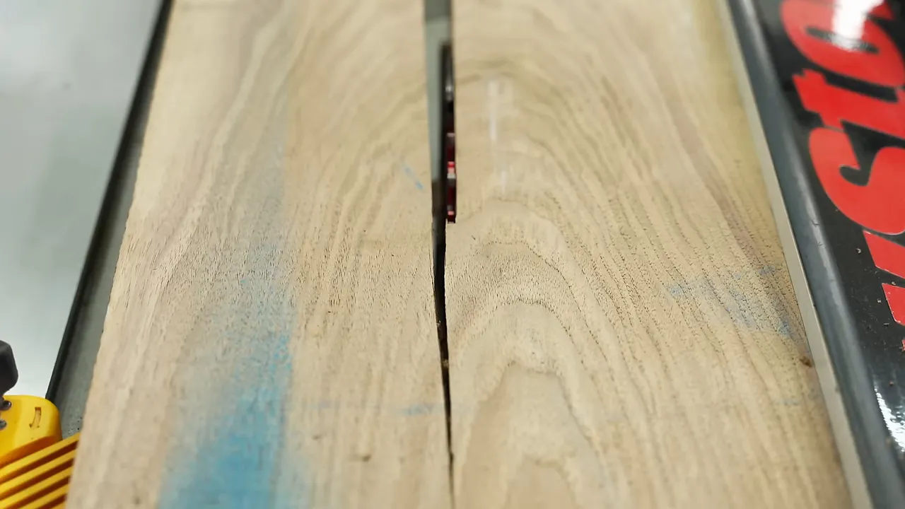 Long split running through a walnut board on the table saw