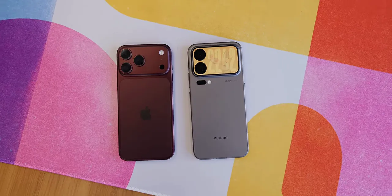 Purple iPhone and gray Xiaomi phone lying side by side, with an animal graphic on Xiaomi's rear screen