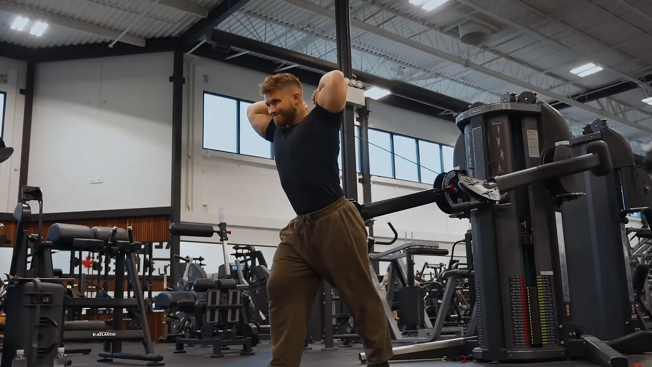Katana triceps extension with two crossed cables and both arms extended overhead