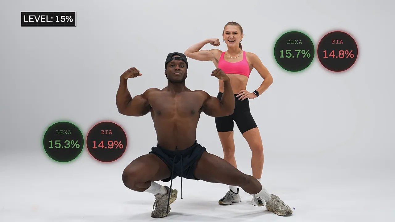 Shemar and Vanessa posing with their DEXA and BIA percentage labels