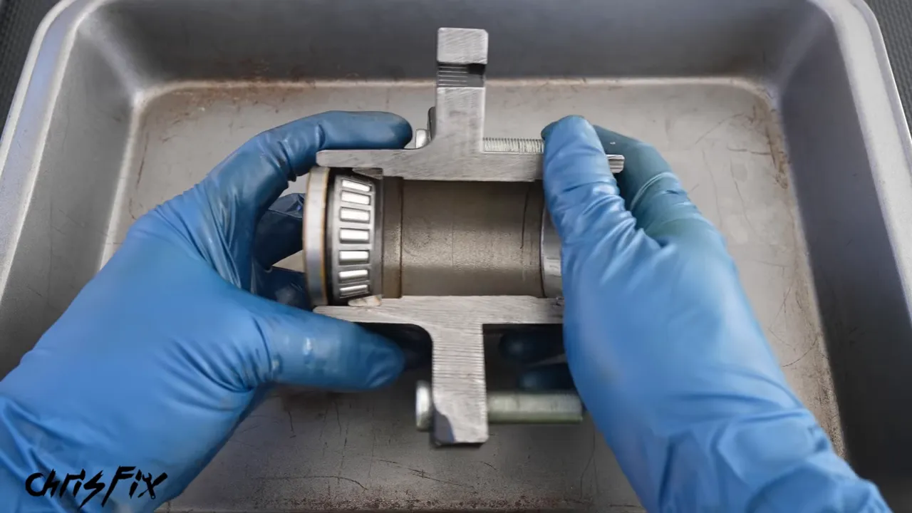 Cutaway trailer hub showing a rear seal and bearing inside the hub