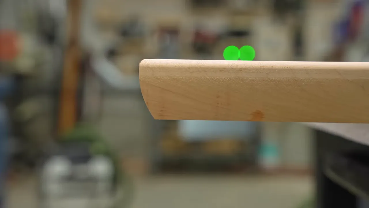 Side view of the shaped edge and rounded top corner on the maple tabletop