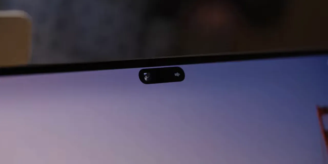 Close-up of the pill-shaped camera cutout near the top of the MacBook display
