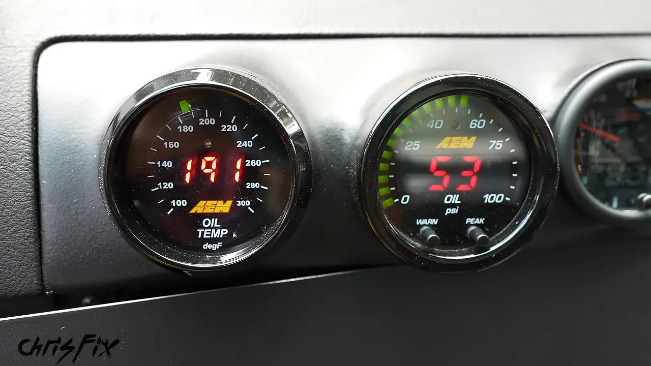 Dashboard oil temperature gauge reading 191 degrees Fahrenheit and oil pressure gauge reading 53 psi