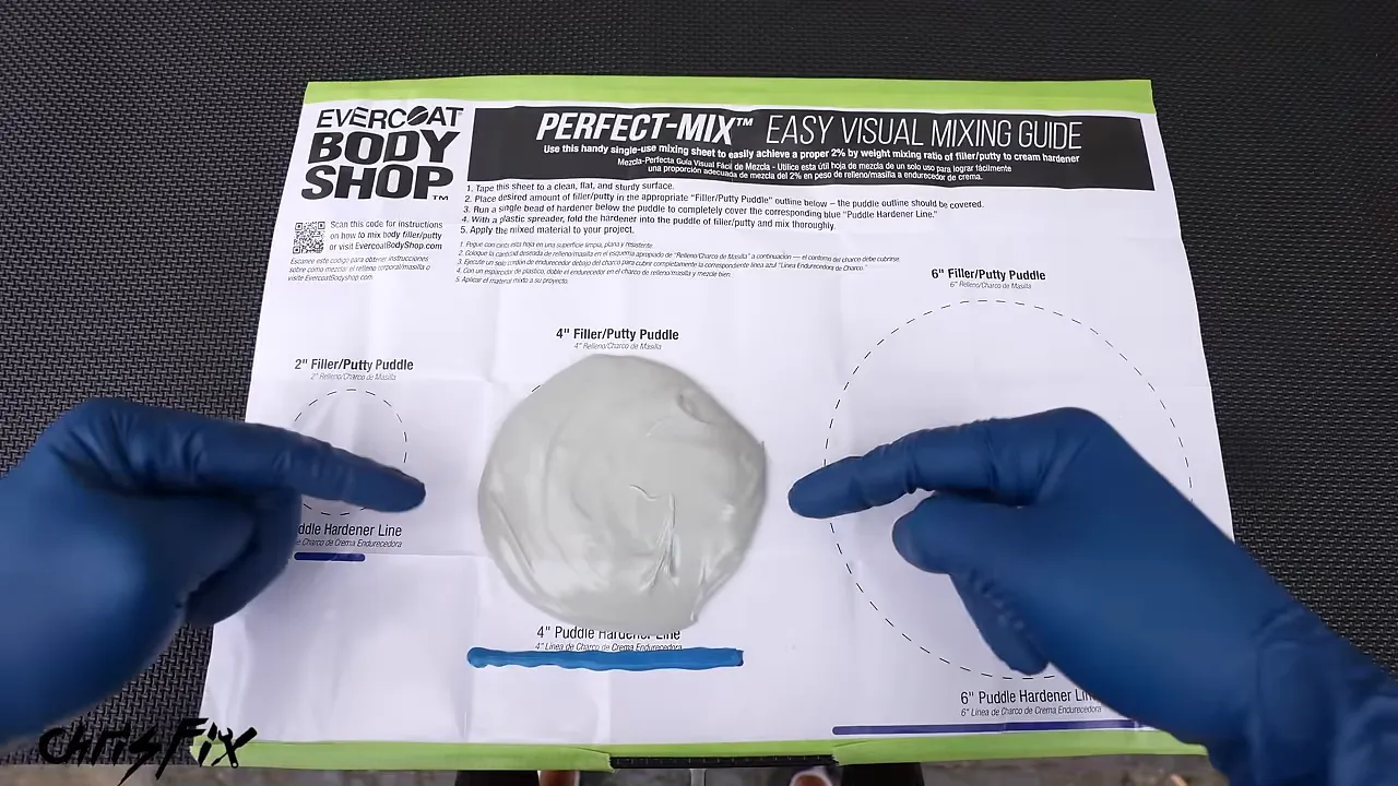 Body filler and a blue bead of hardener measured on a printed mixing guide