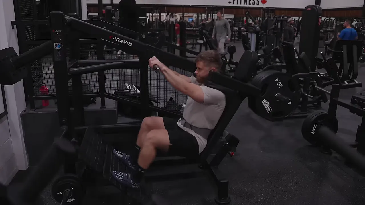 Jeff at the bottom of a pendulum squat with his back against the support pad