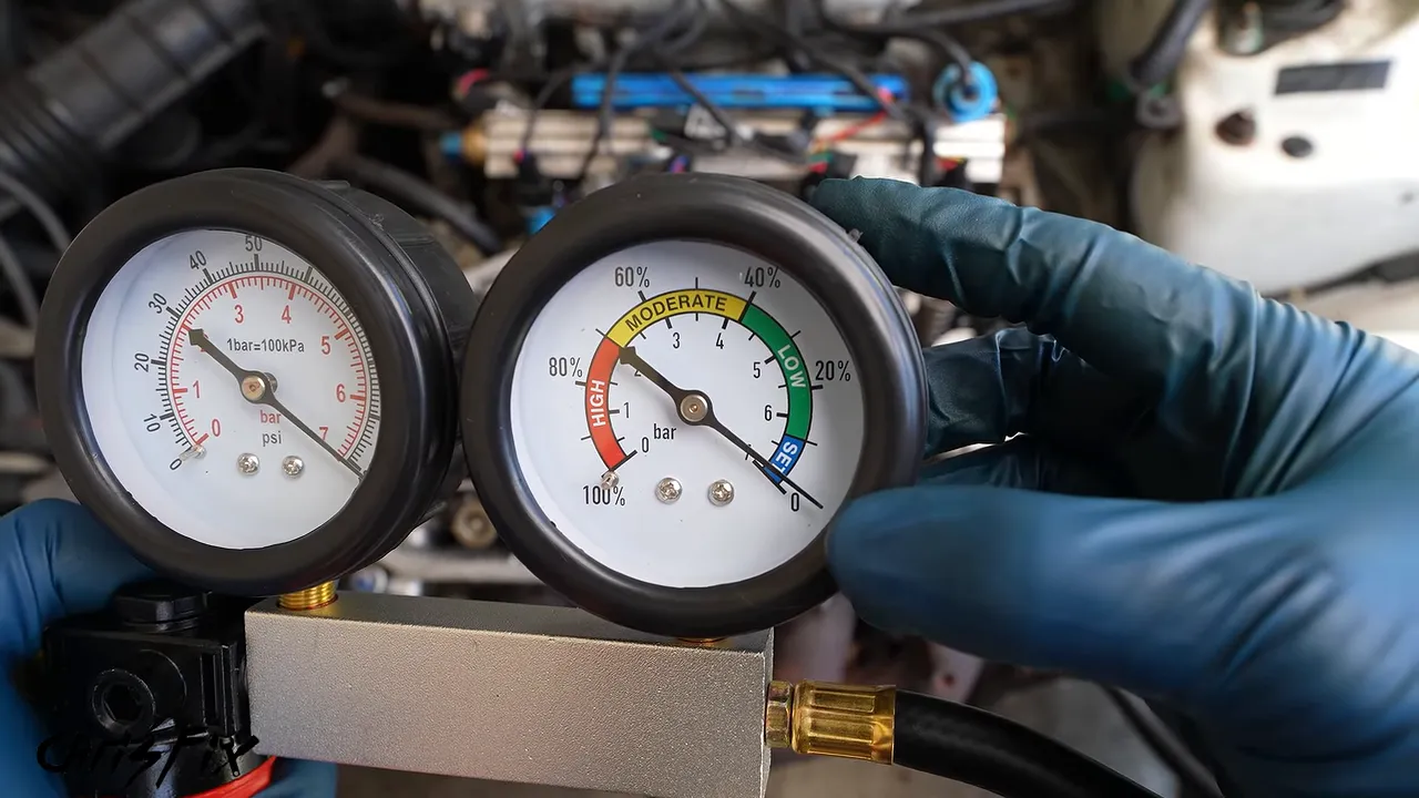 Two-gauge leak-down tester showing supply pressure and a low leakage reading