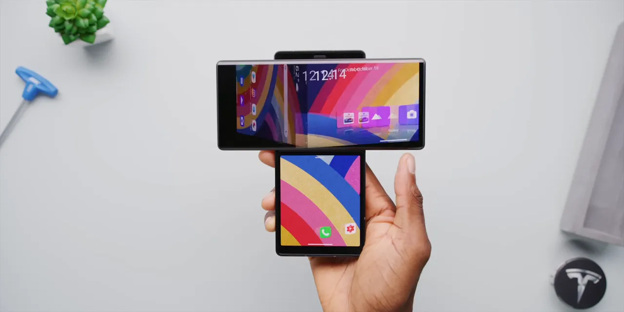 LG Wing held with its main display horizontal above a smaller second screen
