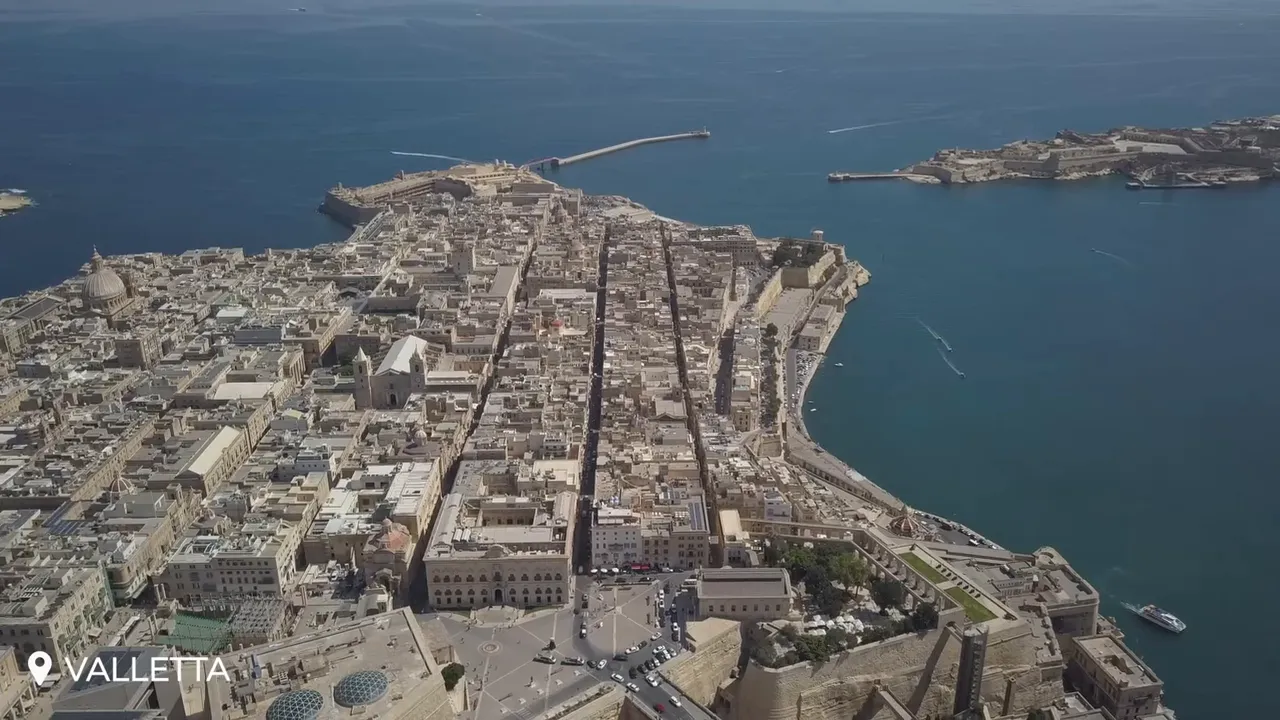 Aerial daytime view of Valletta showing its grid-like streets, fortifications and the Grand Harbour