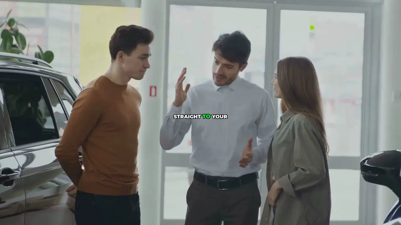 salesperson speaking with two customers inside a car dealership