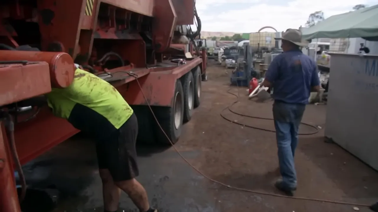 Russell supervising last minute repairs in his Alice Springs yard