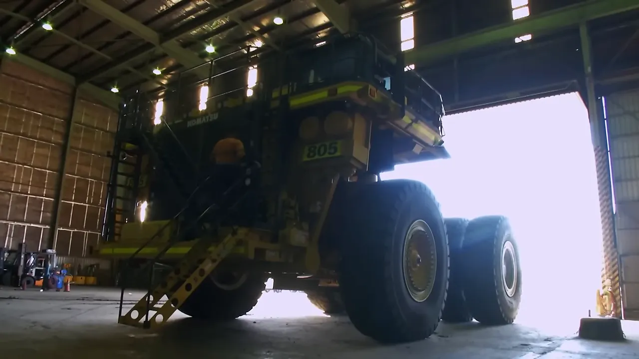 The 130‑tonne dump truck at the mine entrance
