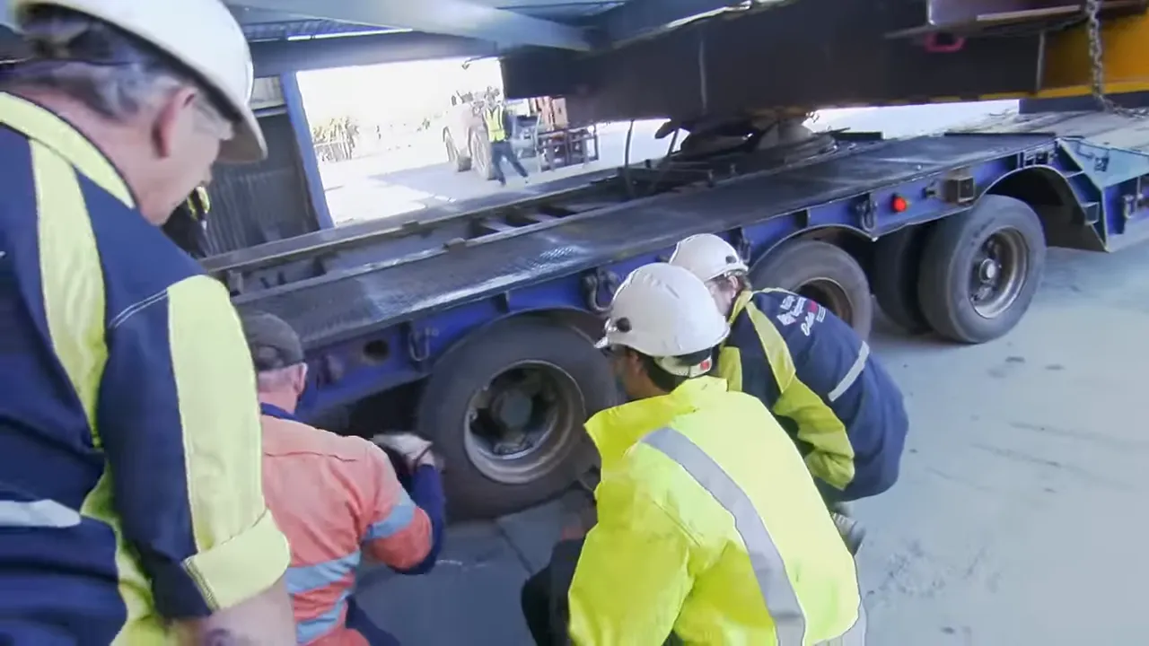 Truck trapped at workshop door frame