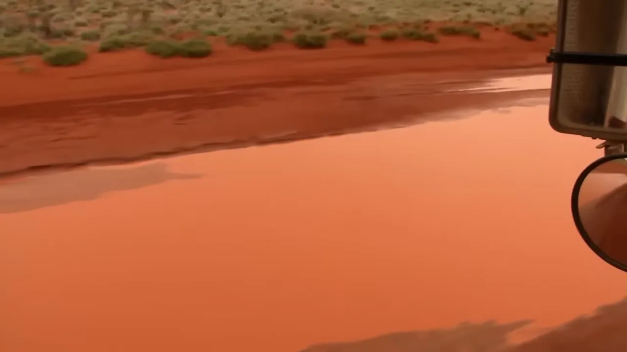 Deep bog hole; truck powering through