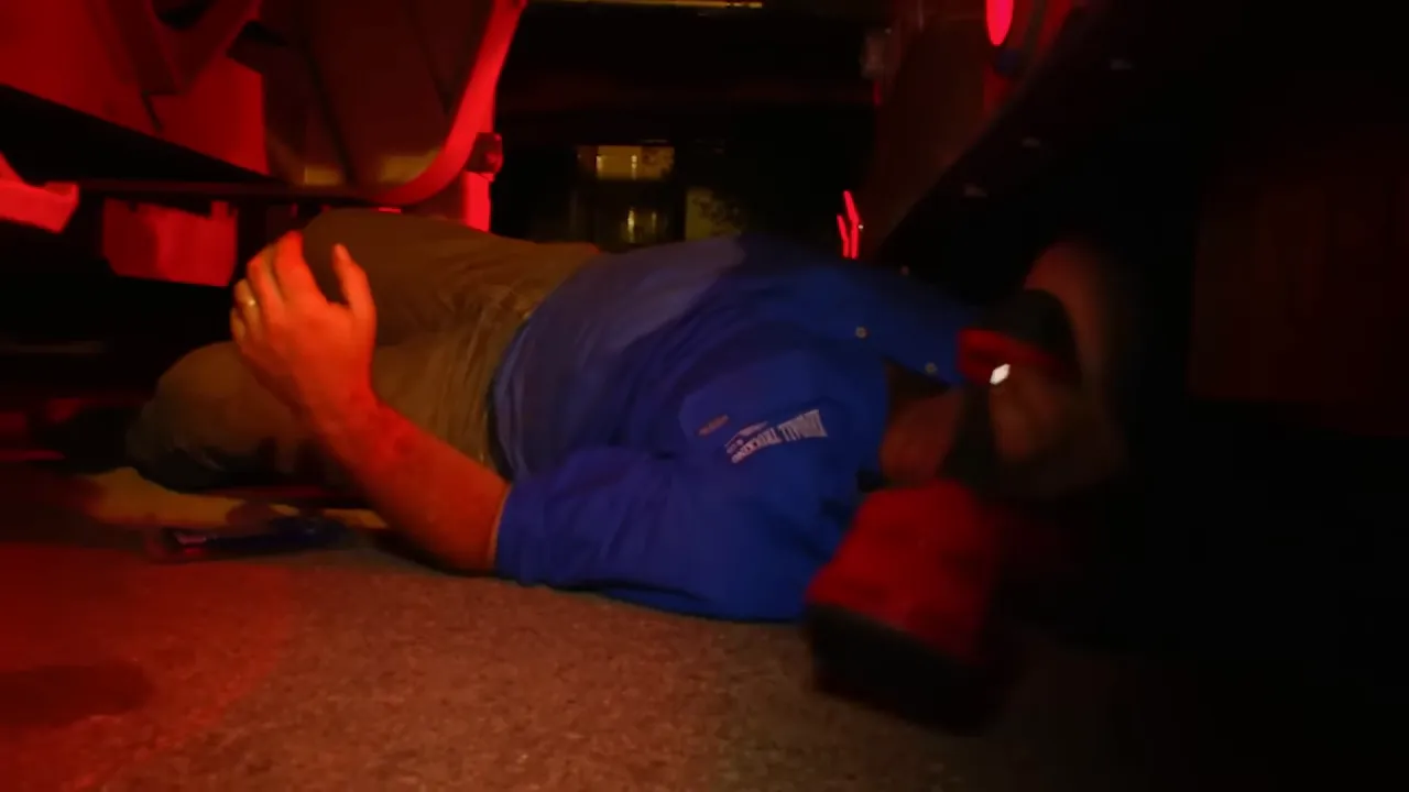 Yogi identifying the wiring short near the number plate light