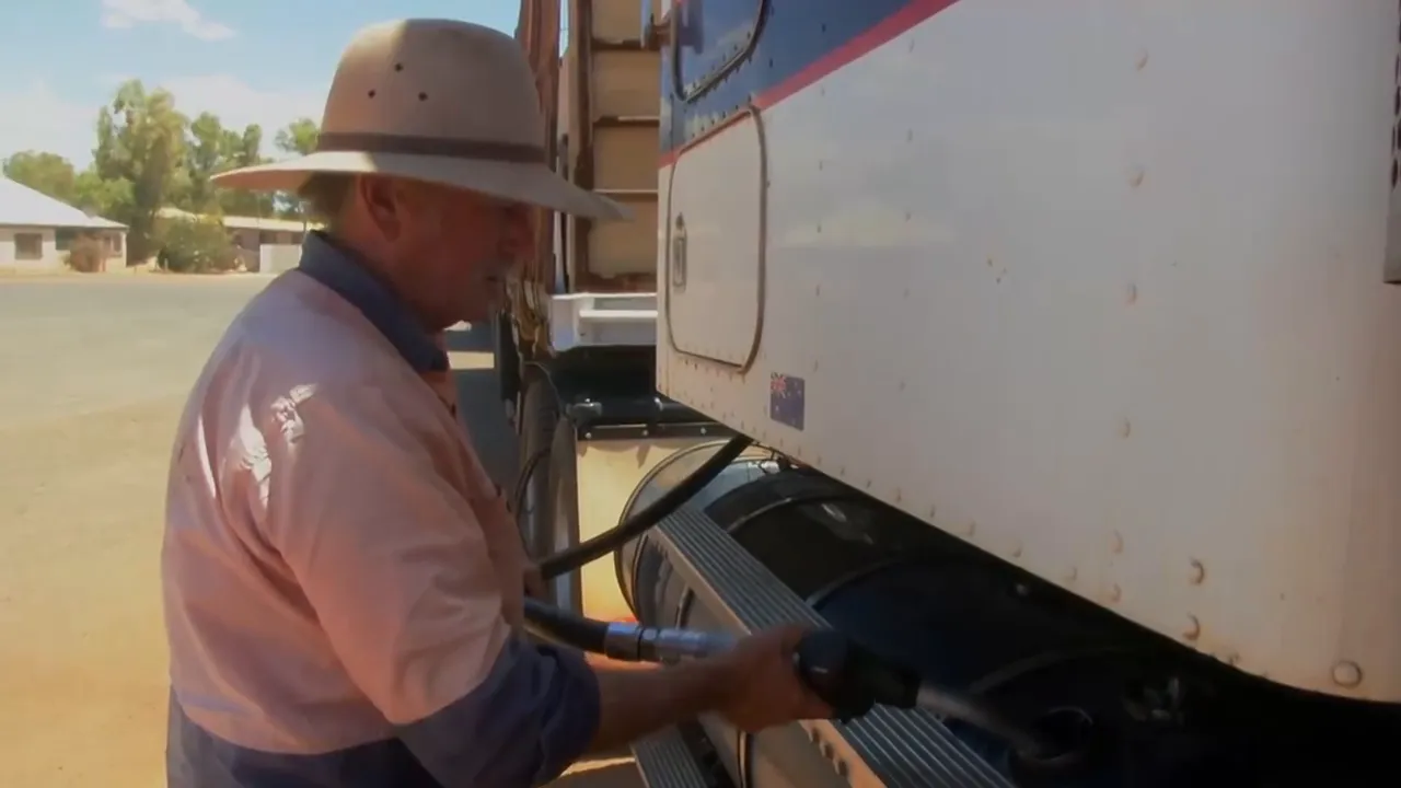 Steve filling up diesel—$2,000 worth to cross the desert