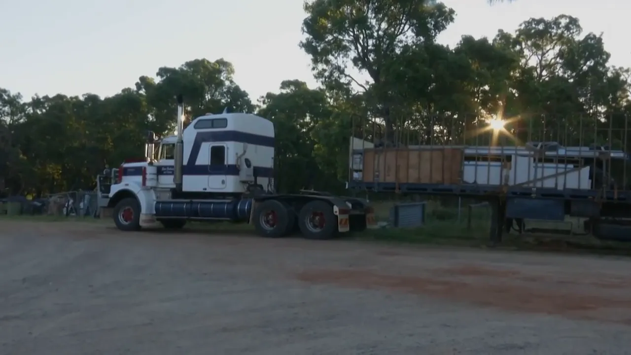 Steve hooking the trailer onto his road train