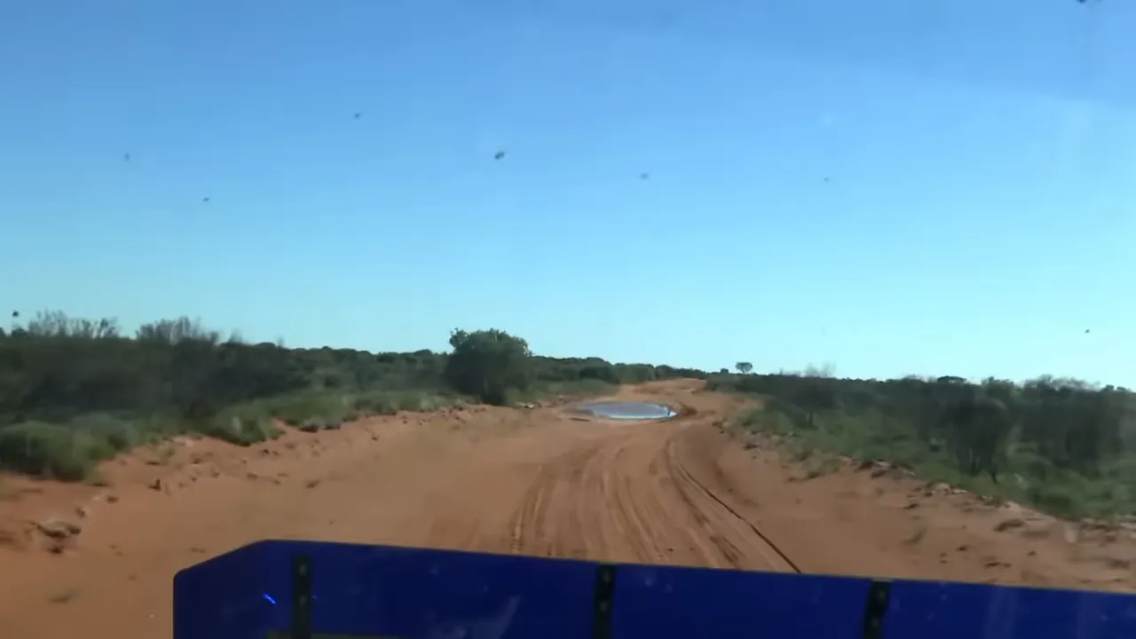 Support crew checking a washout ahead
