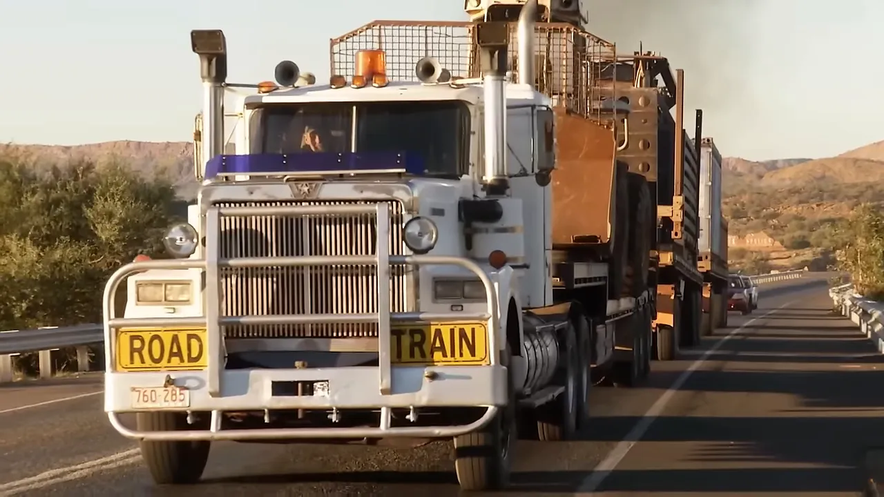The full 50-metre road train on a dirt track