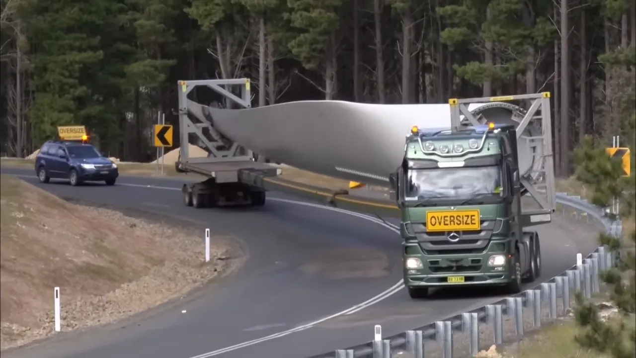The blade taking up almost the entire road on a hairpin bend