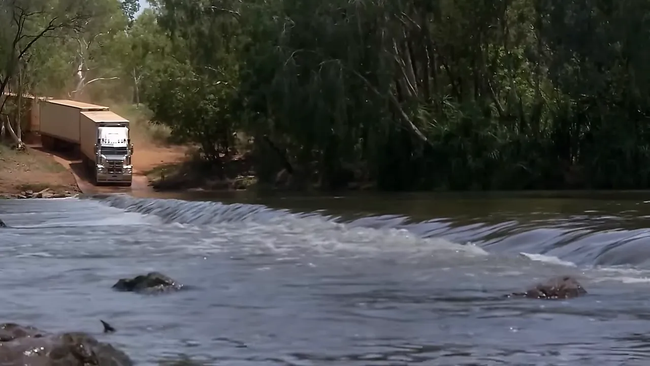 Road train approaching a submerged causeway
