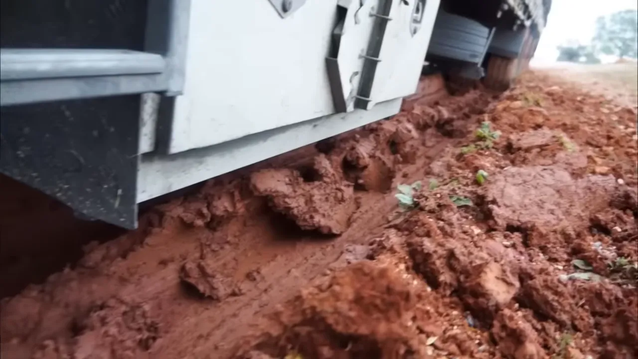 Four-wheel drive helping pull the truck from mud